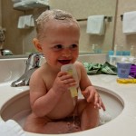 Addie getting a bath in the hotel sink in Moab, UT.