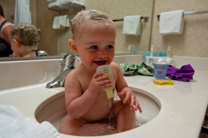 Addie getting a bath in the hotel sink in Moab, UT.