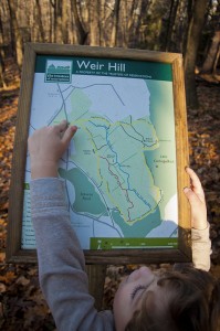 Eoin pointing our position on the Weir Hill Trail Map