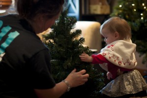 Addie and Mama setting up the Christmas tree