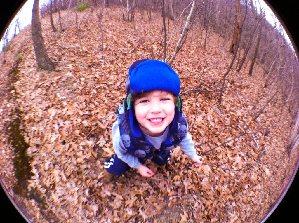 Eoin flashes a smile for the camera while hiking Weir Hill