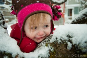 Addie taking a break from playing in the snow.