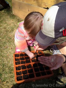 Planting seeds for our garden.