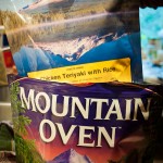 Placing the food pouch into the Mountain Oven.