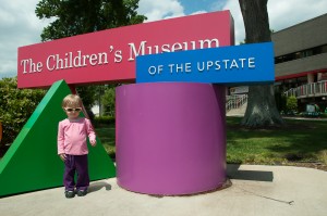 Addie outside the Children's Museum of the Upstate in Greenville, South Carolina.