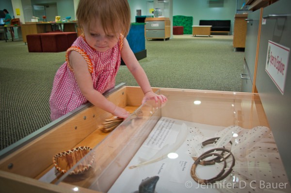 Addie checking out the kid's Art & Nature Pop-Up Center at the Peabody Essex Museum.