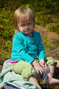 Addie eating M&M's after her swim in East Pond.