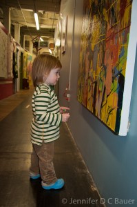 Addie checking out the art at the Western Ave Studios in Lowell, MA.