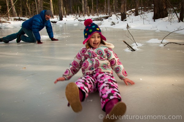 Elizabeth sliding across the frozen Skug River in Andover, MA.