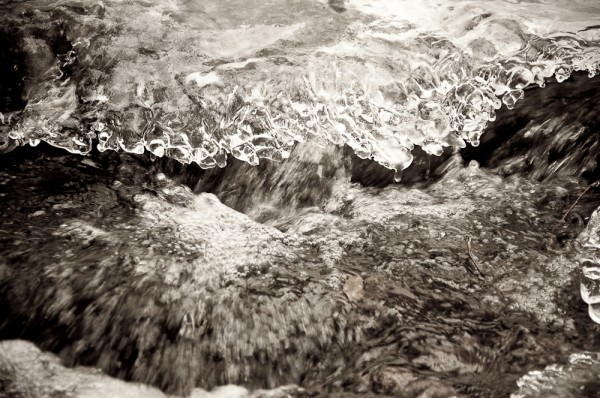 Water running through the ice in Pitcher Brook, Russell, MA