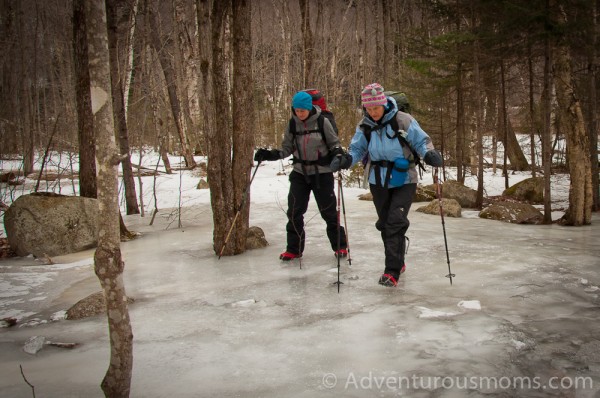 Crossing over the frozen water leading to the Mt. Willard trail in Bretton Woods, NH.