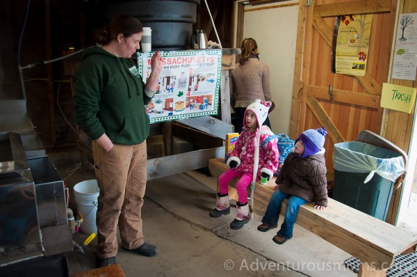 Addie and Elizabeth learning how maple syrup is made at Appleton Farms in Ipswich, MA