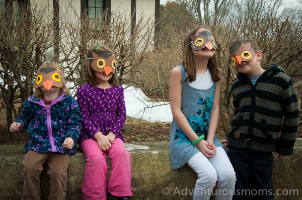 The kids showing off their owl masks!