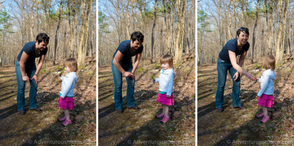 Kate letting Addie smell some skunk cabbage - she did not like it at all!