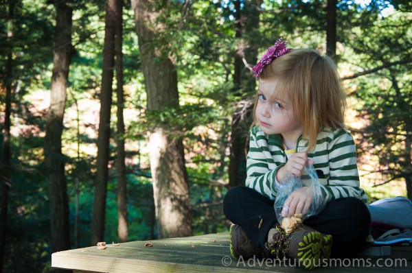 Addie eating her snack at Wilkinson Reservation in Andover, MA