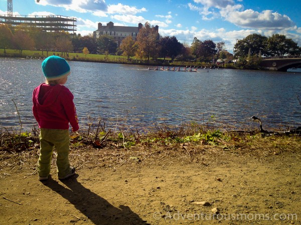 Addie cheering on crews at the Head of the Charles Regatta