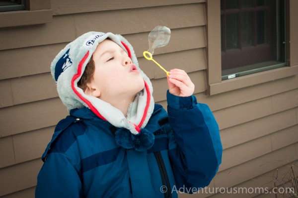 Blowing bubbles in the snow