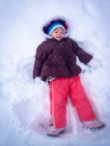 Addie making snow angels