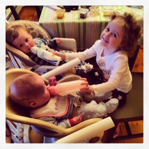 Addie feeding the twins.