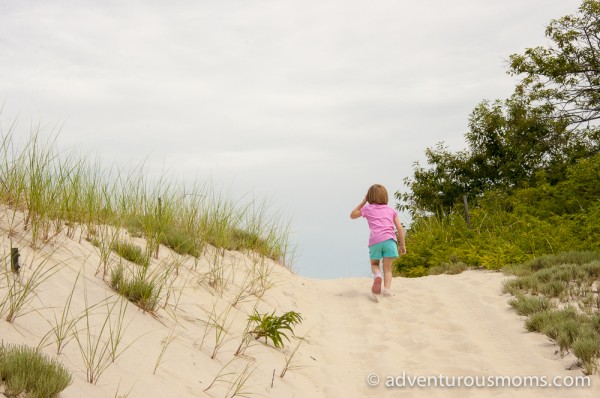 Addie running ahead on the trails at Crane Estate