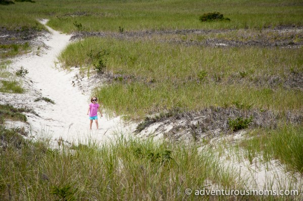 Addie running ahead on the trails at Crane Estate