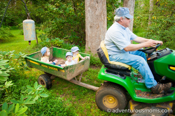 Riding on G-Dad's tractor.