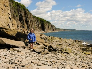 Jane on the rocky beach of Cape Enrage, New Brunswick, Canada.