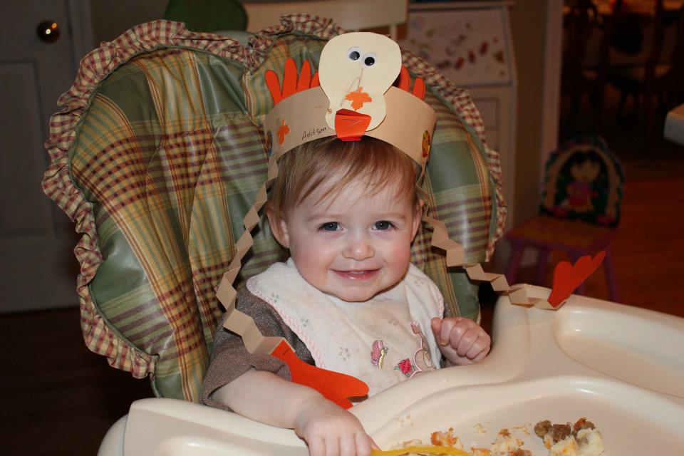 Addie wearing her turkey hat