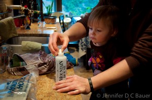 Putting the salt tablet into the bottle for the Mountain Oven.