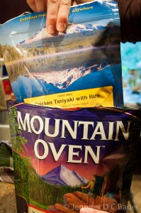 Placing the food pouch into the Mountain Oven.