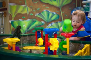 Addison playing in the Toddle Lily Pond a the Children's Museum in Greenville, S.C.