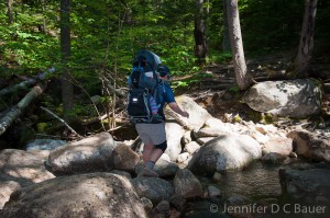 Navigating with Addison across the Imp Brook, which can be difficult when the water is high.