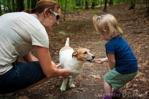 Addie feeding a puppy at Weir Hill in North Andover, MA.