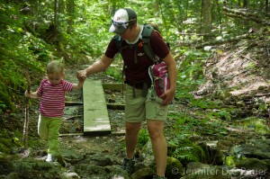 Me helping Addie over some big rocks.