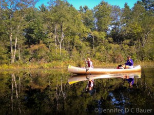 Kelly and Beth paddling down the Ipswich River.