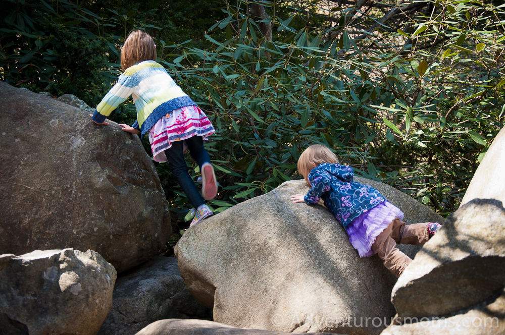 Addie and Elizabeth climbing rocks at the Ipswich River Wildlife Sanctuary